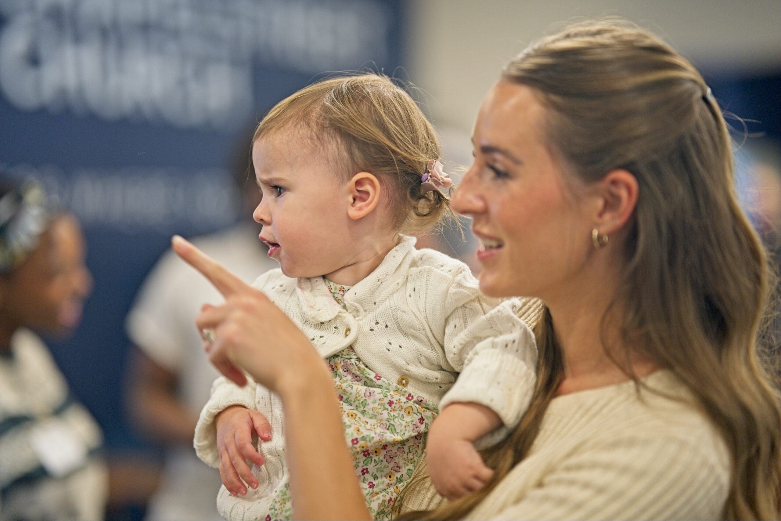 A parent and child sharing a moment at church.