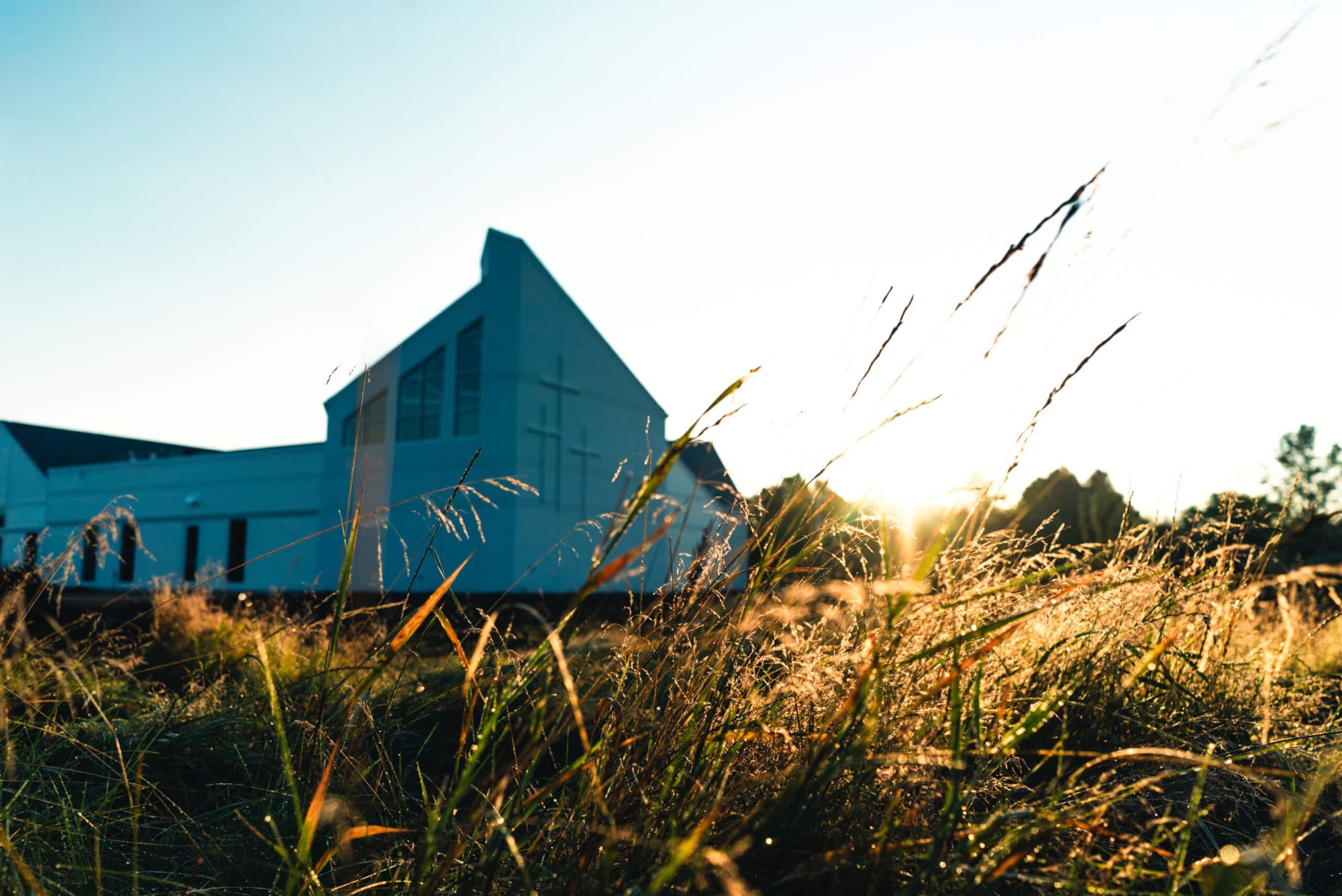 Mill Creek Campus church building at sunrise.